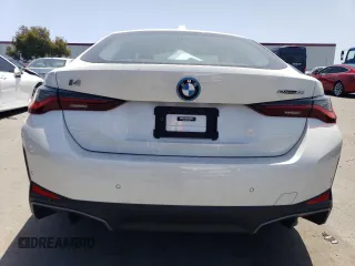 2023 BMW i4 eDrive35 with VIN WBY43AW07PFP64892, listed as a Copart auction lot 55696614 with 3,491 mi miles and Salvage Title. Bid and sale history available at carsss.com. Image 6.