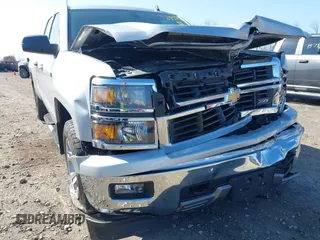 2014 Chevrolet Silverado 1500 LT with VIN 1GCVKREC0EZ151088, listed as a IAAI auction lot 41763808 with 124,668 mi miles and . Bid and sale history available at DreamBid. Image 6.