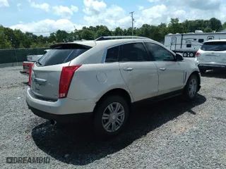 2013 Cadillac SRX Luxury Collection with VIN 3GYFNCE30DS648561, listed as a IAAI auction lot 37139216 with 133,368 mi miles. Bid and sale history available at carsss.com. Image 4.