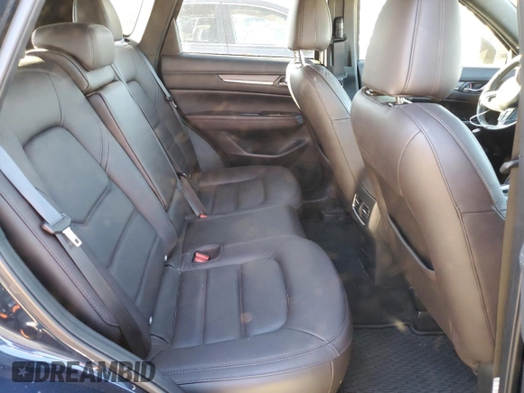 2023 Mazda CX-5 Signature with VIN JM3KFBXY1P0122544, listed as a Copart auction lot 83712034 with 27,032 mi miles and Salvage Title. Bid and sale history available at DreamBid. Image 11.