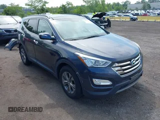 2014 Hyundai Santa Fe with VIN 5XYZU3LB1EG218928, listed as a IAAI auction lot 42634383 with 22,381 mi miles and . Bid and sale history available at DreamBid. Image 1.