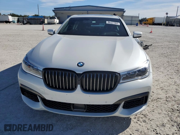 2019 BMW 7 Series 750i с VIN WBA7F0C51KGM24718, выставлен на аукционе Copart как лот 86527984 с пробегом 2 900 миль миль и Списание • Salvage title. История ставок и продаж доступна на DreamBid. Изображение 5.