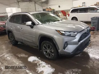 2024 Toyota RAV4 Hybrid XLE Premium with VIN JTMB6RFV5RD148973, listed as a IAAI auction lot 41516422 with 8,797 mi miles. Bid and sale history available at carsss.com. Image 1.