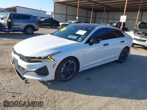 2022 Kia K5 GT-Line z VIN 5XXG64J23NG089623, wystawiony jako IAAI lot #42109751 z przebiegiem 128 273 mil mil oraz . Historia ofert i sprzedaży dostępna na DreamBid. Obrazek 2.