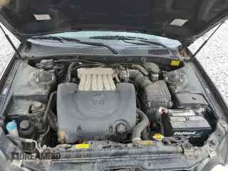 2002 Hyundai Sonata GLS with VIN KMHWF35H52A615774, listed as a Copart auction lot 72336474 with 156,588 mi miles and Salvage Title. Bid and sale history available at carsss.com. Image 11.