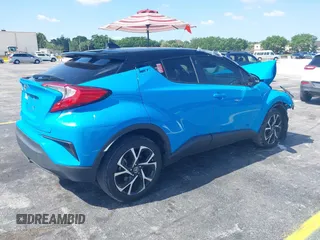 2019 Toyota C-HR XLE with VIN NMTKHMBX6KR097934, listed as a IAAI auction lot 39276687 with 56,973 mi miles. Bid and sale history available at carsss.com. Image 4.