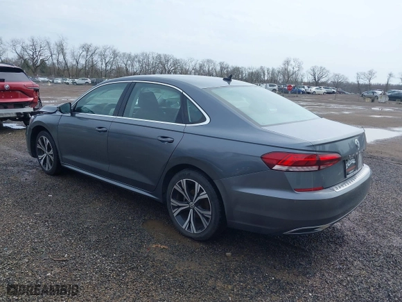 2021 Volkswagen Passat 2.0T SE with VIN 1VWSA7A3XMC011113, listed as a IAAI auction lot 41942881 with 63,753 mi miles. Bid and sale history available at carsss.com. Image 3.
