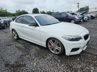 2015 BMW 2 Series 228i xDrive with VIN WBA1F7C56FVX95728, listed as a Copart auction lot 63245595 with 95,470 mi miles and Clean title. Bid and sale history available at DreamBid. Image 4.