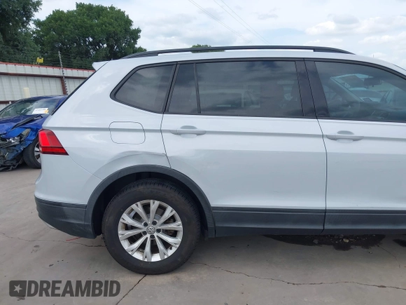 2018 Volkswagen Tiguan S with VIN 3VV1B7AX0JM092116, listed as a IAAI auction lot 42388339 with 103,412 mi miles and . Bid and sale history available at DreamBid. Image 17.