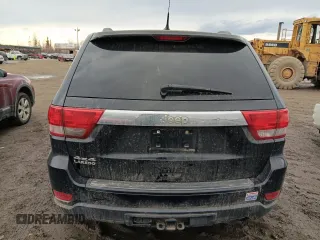 2011 Jeep Grand Cherokee Laredo z VIN 1J4RR4GG5BC508211, wystawiony jako Copart lot #53729935 z przebiegiem 124 408 mil mil oraz Szkoda całkowita • Salvage title. Historia ofert i sprzedaży dostępna na DreamBid. Obrazek 6.
