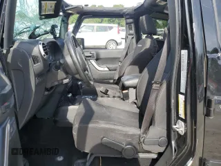 2016 Jeep Wrangler Unlimited Rubicon with VIN 1C4BJWFG7GL320650, listed as a Copart auction lot 53900195 with 77,620 mi miles and Salvage title. Bid and sale history available at DreamBid. Image 7.
