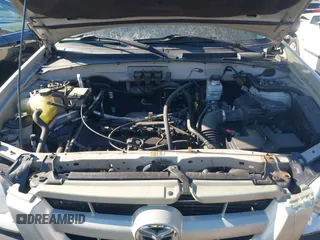 2006 Mazda Tribute i with VIN 4F2YZ92Z66KM10050, listed as a IAAI auction lot 41346153 with 139,668 mi miles and . Bid and sale history available at carsss.com. Image 10.