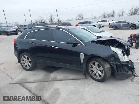 2015 Cadillac SRX Premium Collection z VIN 3GYFNDE3XFS576695, wystawiony jako IAAI lot #41612836 z przebiegiem Nie podano mil oraz . Historia ofert i sprzedaży dostępna na DreamBid. Obrazek 13.