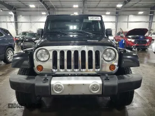 2013 Jeep Wrangler Sahara z VIN 1C4AJWBG5DL566559, wystawiony jako Copart lot #54823405 z przebiegiem 134 099 mil mil oraz Szkoda całkowita • Salvage title. Historia ofert i sprzedaży dostępna na DreamBid. Obrazek 5.