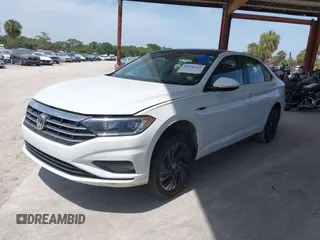 2019 Volkswagen Jetta SEL Premium z VIN 3VWGB7BU6KM168451, wystawiony jako IAAI lot #42090183 z przebiegiem 75 851 mil mil oraz . Historia ofert i sprzedaży dostępna na DreamBid. Obrazek 2.