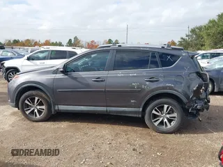 2018 Toyota RAV4 XLE with VIN 2T3WFREV4JW417555, listed as a IAAI auction lot 41092589 with 93,788 mi miles and . Bid and sale history available at DreamBid. Image 15.
