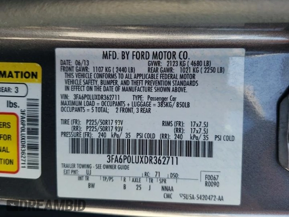 2013 Ford Fusion SE Hybrid z VIN 3FA6P0LUXDR362711, wystawiony jako Copart lot #57060425 z przebiegiem 155 031 mil mil oraz Szkoda całkowita • Salvage title. Historia ofert i sprzedaży dostępna na DreamBid. Obrazek 12.