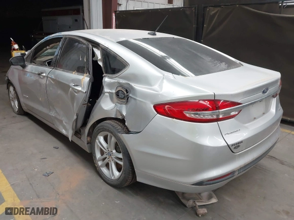 2018 Ford Fusion Hybrid SE with VIN 3FA6P0LUXJR170152, listed as a IAAI auction lot 41467621 with 150,048 mi miles. Bid and sale history available at carsss.com. Image 3.