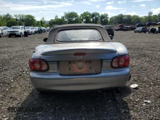 2002 Mazda MX-5 Miata Cloth z VIN JM1NB353520224582, wystawiony jako Copart lot #63669835 z przebiegiem 88 455 mil mil oraz Szkoda całkowita • Salvage title. Historia ofert i sprzedaży dostępna na DreamBid. Obrazek 6.
