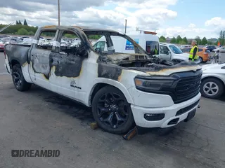 2023 Ram 1500 Limited with VIN 1C6SRFHT9PN602190, listed as a IAAI auction lot 42090395 with Not provided miles and . Bid and sale history available at DreamBid. Image 1.