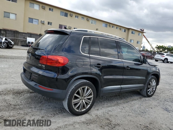 2014 Volkswagen Tiguan SE with VIN WVGAV3AXXEW543245, listed as a Copart auction lot 42288905 with 92,851 mi miles and Salvage title. Bid and sale history available at DreamBid. Image 3.