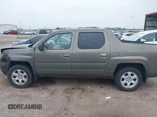 2007 Honda Ridgeline RTL with VIN 2HJYK16517H513832, listed as a IAAI auction lot 42626411 with 209,171 mi miles and . Bid and sale history available at DreamBid. Image 14.