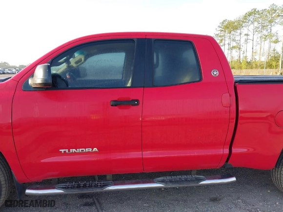 2012 Toyota Tundra 2WD Truck with VIN 5TFRM5F17CX039317, listed as a IAAI auction lot 41805953 with 237,593 mi miles. Bid and sale history available at carsss.com. Image 14.