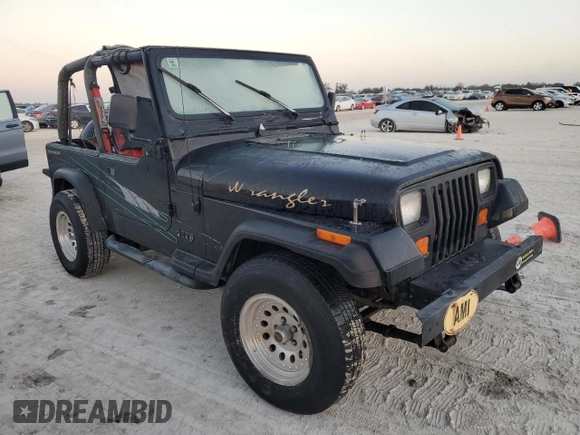 1992 Jeep Wrangler with VIN 2J4FY29SXNJ554171, listed as a Copart auction lot 77655294 with 115,494 mi miles and Salvage Title. Bid and sale history available at carsss.com. Image 4.