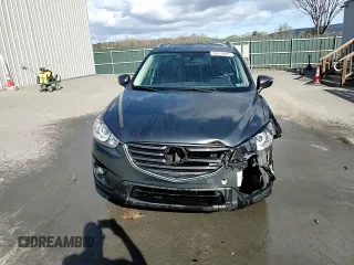 2016 Mazda CX-5 Grand Touring with VIN JM3KE4DY0G0679190, listed as a Copart auction lot 53619495 with 154,649 mi miles and Salvage Title. Bid and sale history available at carsss.com. Image 14.