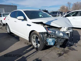 2015 Kia Optima LX z VIN KNAGM4A76F5575752, wystawiony jako IAAI lot #41159046 z przebiegiem 162 450 mil mil oraz . Historia ofert i sprzedaży dostępna na DreamBid. Obrazek 1.
