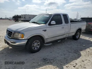 1999 Ford F-250 with VIN 1FTRX27L8XKA26097, listed as a Copart auction lot 43270015 with 201,792 mi miles and Salvage title. Bid and sale history available at DreamBid. Image 1.