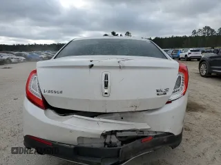 2013 Lincoln MKS EcoBoost with VIN 1LNHL9FT0DG607721, listed as a Copart auction lot 85129344 with 158,191 mi miles and Salvage title. Bid and sale history available at DreamBid. Image 6.
