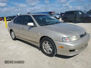 2002 Infiniti G20 Luxury z VIN JNKCP11A12T501940, wystawiony jako Copart lot #74041014 z przebiegiem Nie podano mil oraz Szkody całkowita. Historia ofert i sprzedaży dostępna na DreamBid. Obrazek 4.