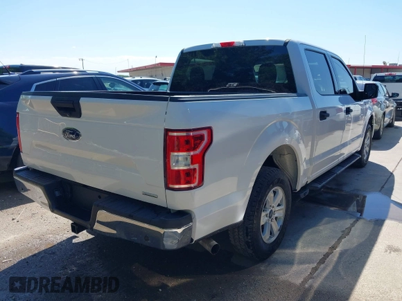2018 Ford F-150 XL with VIN 1FTEW1CG3JKF83060, listed as a IAAI auction lot 42082403 with 96,647 mi miles. Bid and sale history available at carsss.com. Image 4.