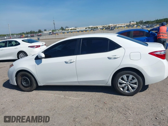 2015 Toyota Corolla L with VIN 2T1BURHE1FC252615, listed as a IAAI auction lot 41884936 with 113,805 mi miles and . Bid and sale history available at DreamBid. Image 14.