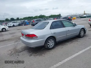 2002 Honda Accord SE с VIN 1HGCG56712A088663, выставлен на аукционе IAAI как лот 42520639 с пробегом 2 304 496 миль миль и . История ставок и продаж доступна на DreamBid. Изображение 4.