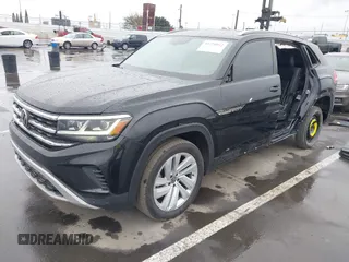 2022 Volkswagen Atlas SE z VIN 1V2WE2CA3NC203707, wystawiony jako IAAI lot #41720912 z przebiegiem 50 572 mil mil oraz . Historia ofert i sprzedaży dostępna na DreamBid. Obrazek 2.