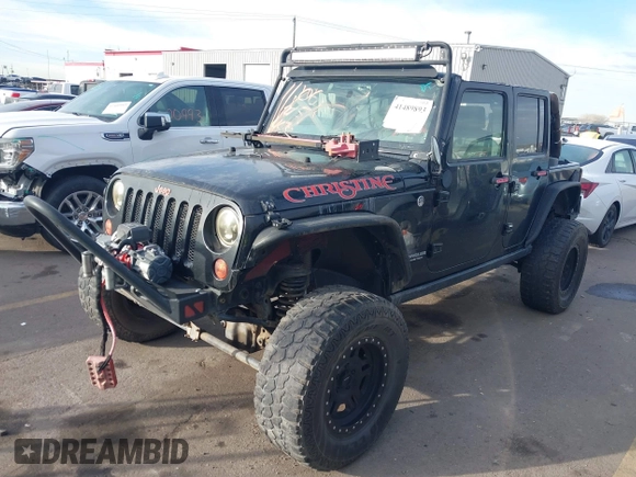 2009 Jeep Wrangler Unlimited Rubicon z VIN 1J4GA69159L749215, wystawiony jako IAAI lot #41489893 z przebiegiem 177 768 mil mil oraz . Historia ofert i sprzedaży dostępna na DreamBid. Obrazek 19.
