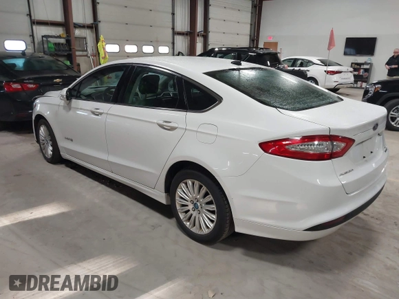 2013 Ford Fusion SE Hybrid with VIN 3FA6P0LU7DR254983, listed as a IAAI auction lot 41883531 with 188,585 mi miles and . Bid and sale history available at carsss.com. Image 3.
