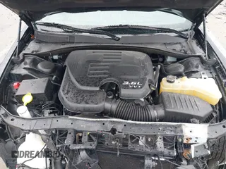 2021 Chrysler 300 Touring with VIN 2C3CCARGXMH576100, listed as a IAAI auction lot 41650864 with 104,222 mi miles. Bid and sale history available at carsss.com. Image 10.