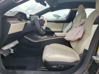 2023 Tesla Model S z VIN 5YJSA1E58PF531166, wystawiony jako Copart lot #51827565 z przebiegiem Nie podano mil oraz Szkoda całkowita • Salvage title. Historia ofert i sprzedaży dostępna na DreamBid. Obrazek 7.