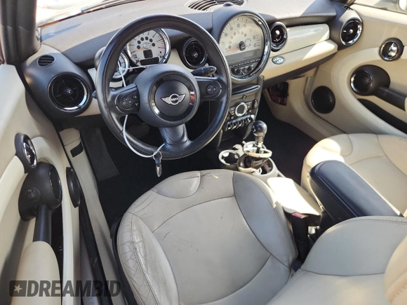 2011 MINI Convertible with VIN WMWZN3C59BTZ78433, listed as a Copart auction lot 65509575 with 102,800 mi miles and Clean title. Bid and sale history available at DreamBid. Image 8.