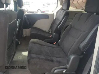2014 Dodge Grand Caravan American Value with VIN 2C4RDGBG8ER245897, listed as a Copart auction lot 54066945 with 144,177 mi miles and Clean Title. Bid and sale history available at DreamBid. Image 11.