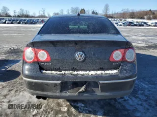 2009 Volkswagen Passat Komfort z VIN WVWJK73C79P056163, wystawiony jako Copart lot #42095525 z przebiegiem 132 709 mil mil oraz Szkoda całkowita • Salvage title. Historia ofert i sprzedaży dostępna na DreamBid. Obrazek 6.