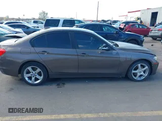 2014 BMW 3 Series 320i xDrive with VIN WBA3C3C58EF983816, listed as a IAAI auction lot 41949430 with 111,627 mi miles. Bid and sale history available at carsss.com. Image 13.