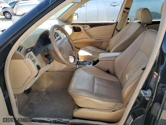 2001 Mercedes-Benz E-Class AWD with VIN WDBJF83J31X058259, listed as a Copart auction lot 74370604 with 131,454 mi miles and Clean Title. Bid and sale history available at carsss.com. Image 7.