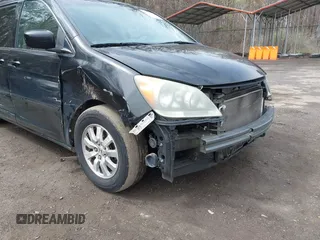 2009 Honda Odyssey EX-L with VIN 5FNRL387X9B051750, listed as a IAAI auction lot 41953221 with 205,142 mi miles. Bid and sale history available at carsss.com. Image 6.