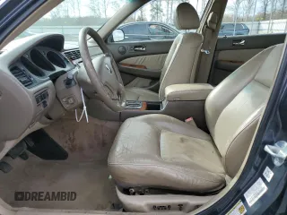 2004 Acura RL w/Navigation System with VIN JH4KA96604C007250, listed as a Copart auction lot 49997655 with 236,342 mi miles and Salvage Title. Bid and sale history available at DreamBid. Image 7.