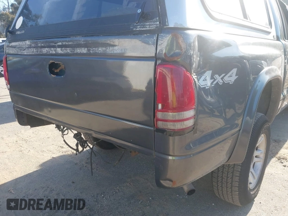2003 Dodge Dakota SLT with VIN 1D7HG48N33S248568, listed as a IAAI auction lot 41834084 with 153,001 mi miles and . Bid and sale history available at DreamBid. Image 13.