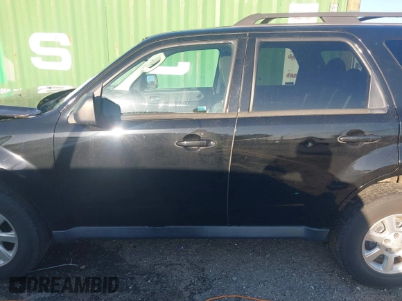 2010 Mazda Tribute Sport with VIN 4F2CY9C74AKM03679, listed as a IAAI auction lot 41740156 with 142,208 mi miles and . Bid and sale history available at DreamBid. Image 14.